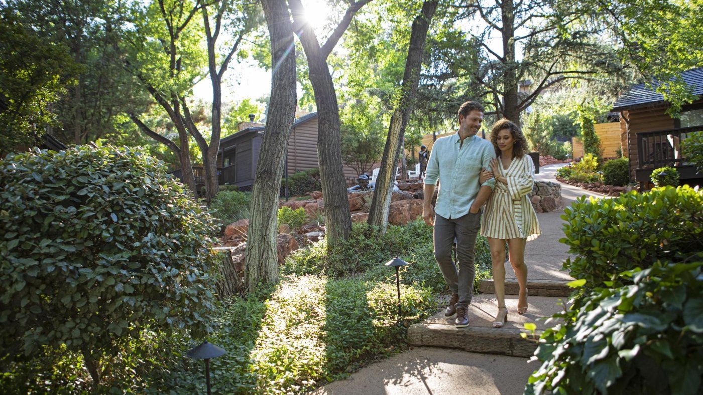 Couple stroll through L'Auberge