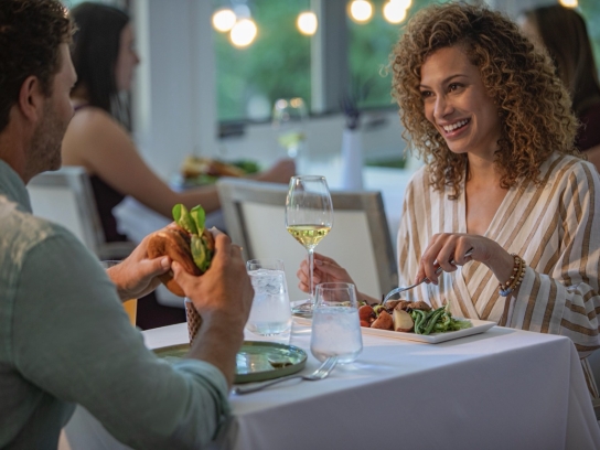 People enjoying a meal at the Cress restaurant on Oak Creek