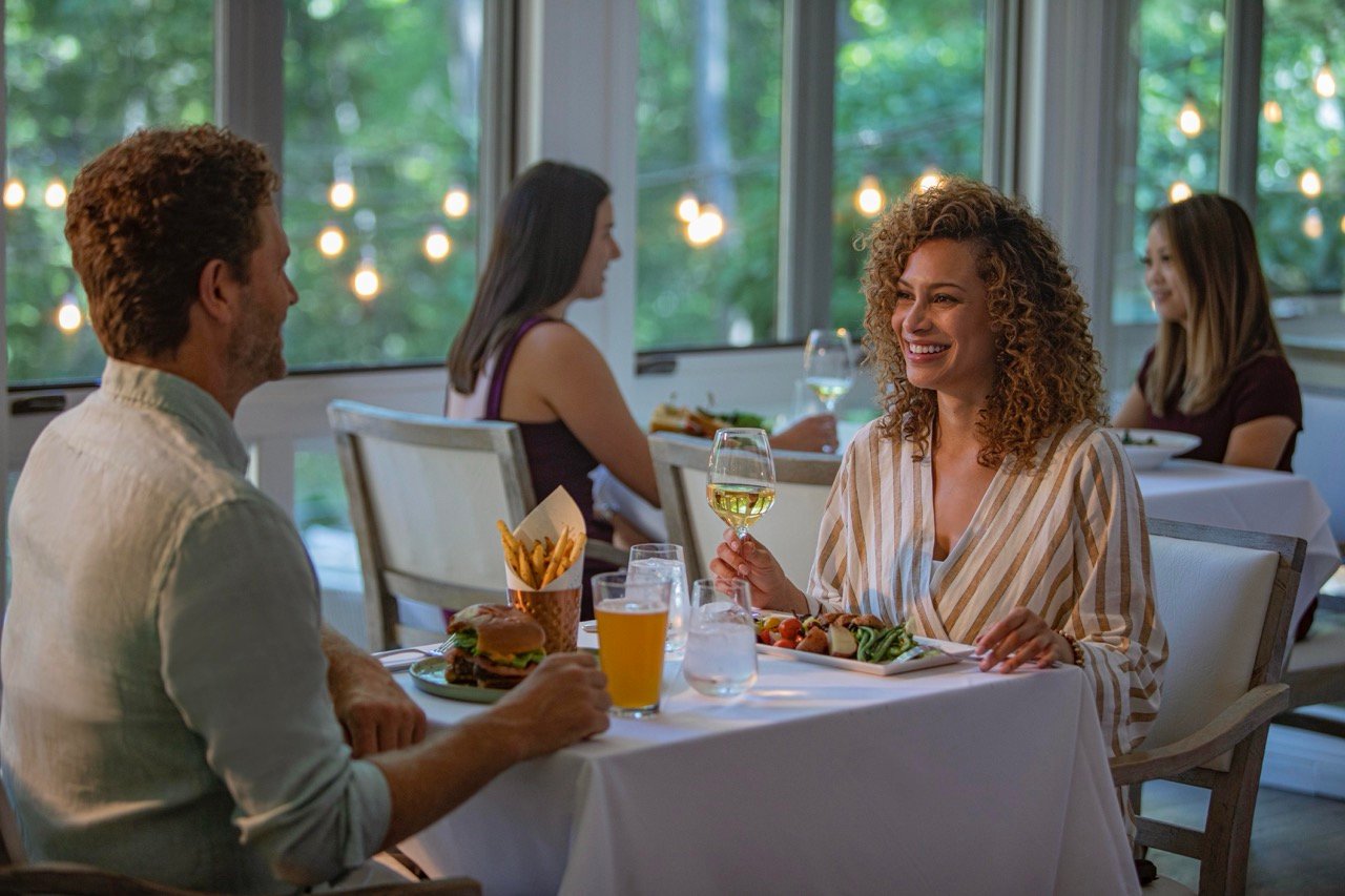 People enjoying a meal at the Cress restaurant on Oak Creek