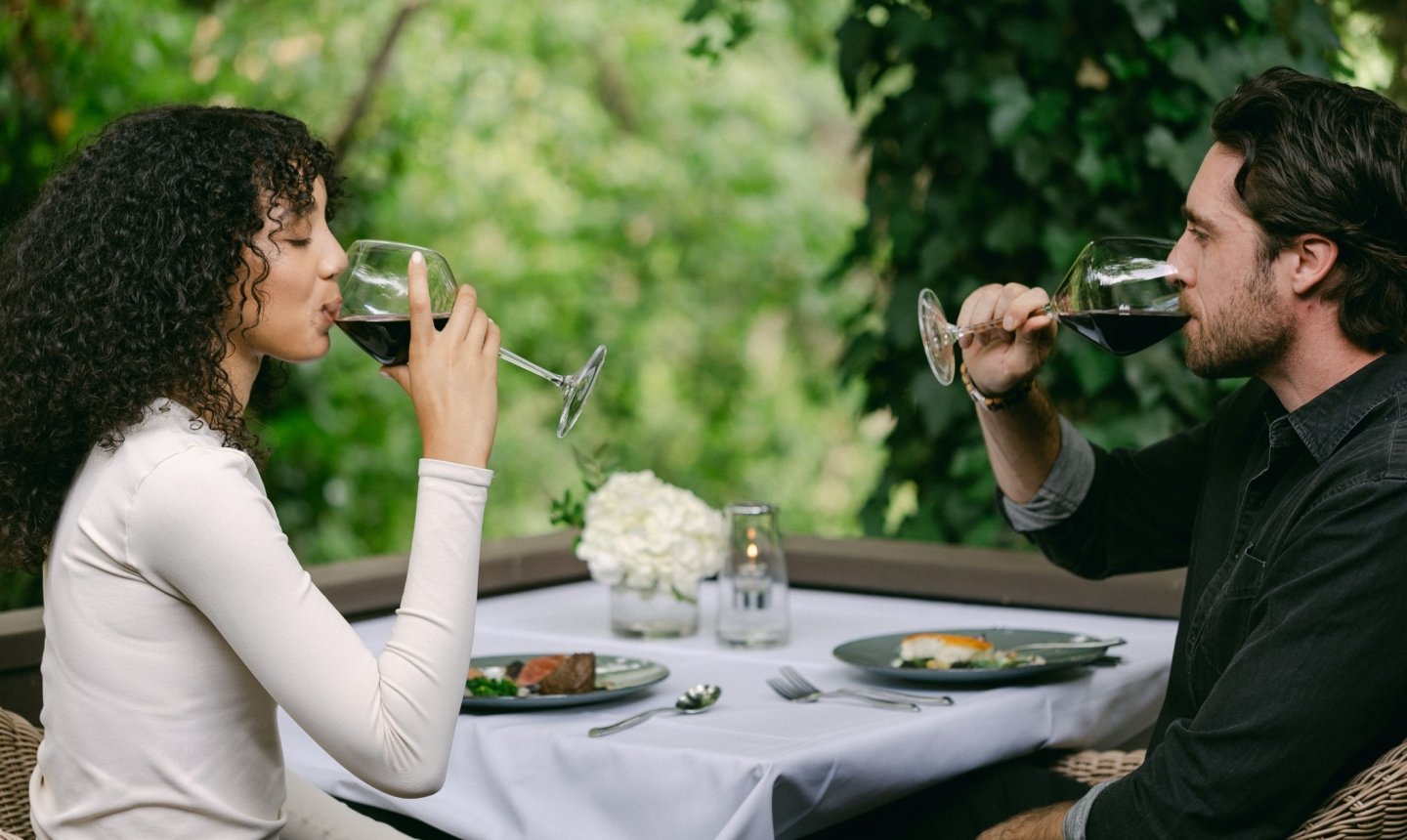 two people enjoying wine at the Cress Bar