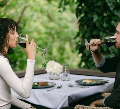 two people enjoying wine at the Cress Bar
