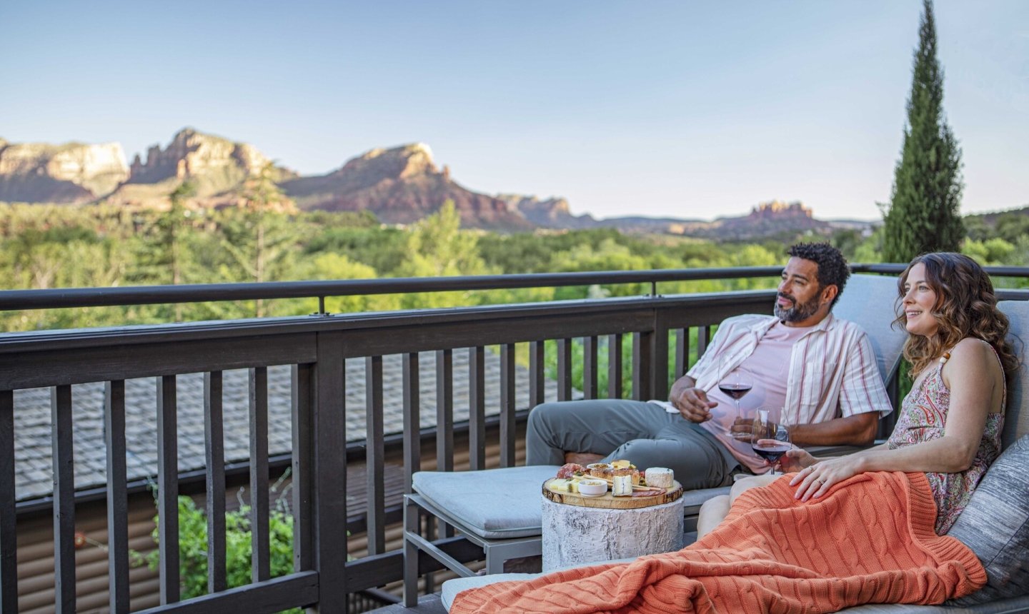 Couple lounging on the balcony
