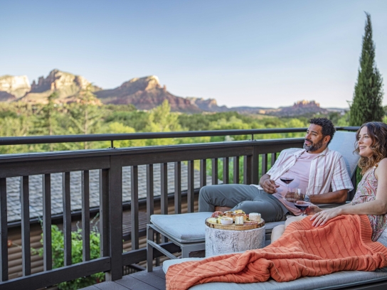 Couple lounging on the balcony