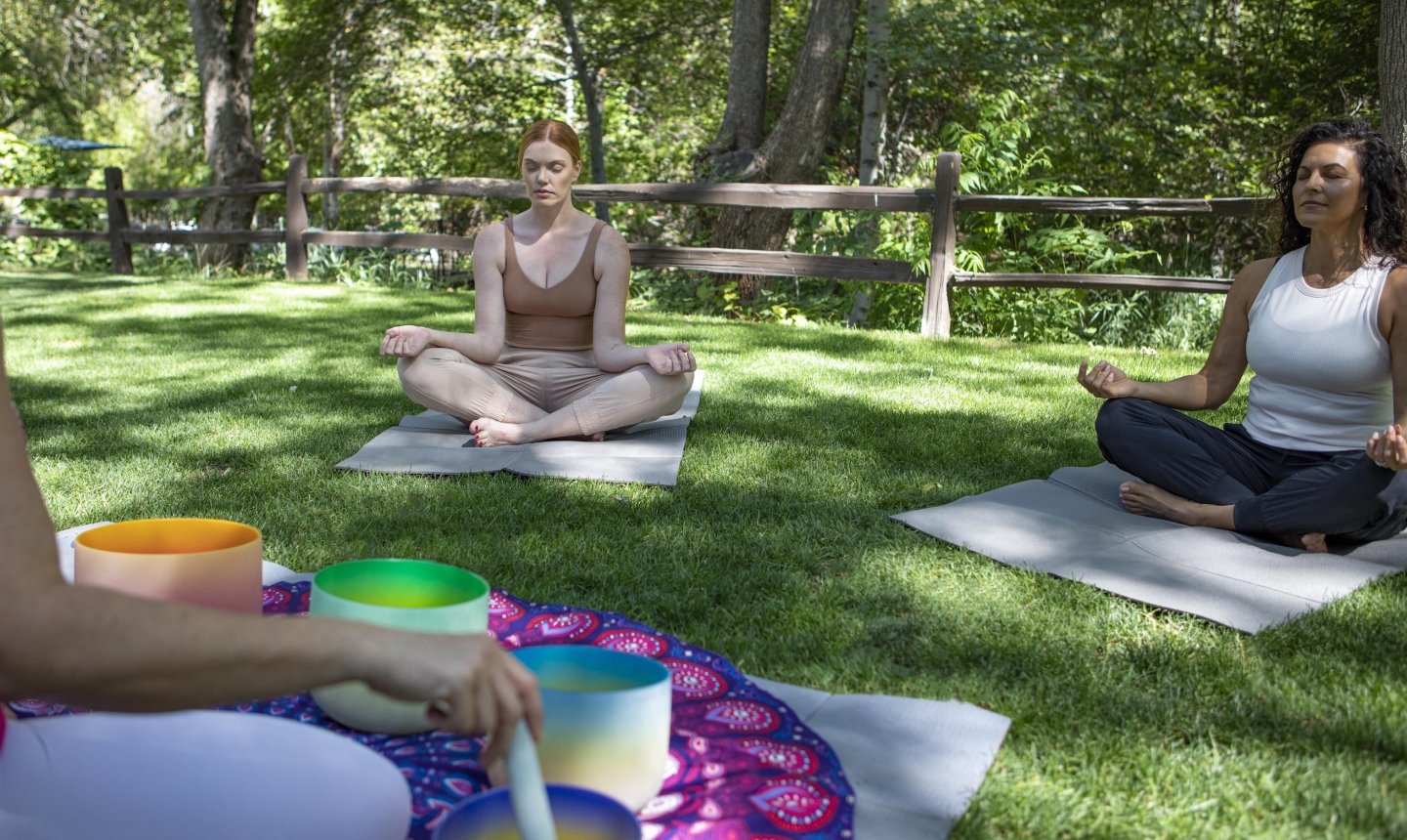 People doing yoga at L'Apothecary spa