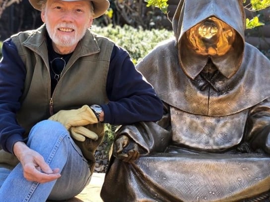 An artist beside his art. Goldenstein Gallery