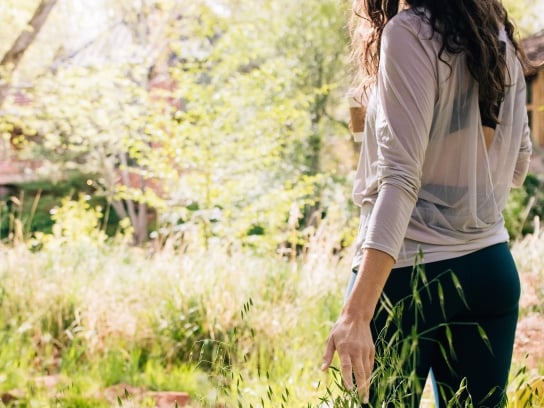 Woman Walking Creekside