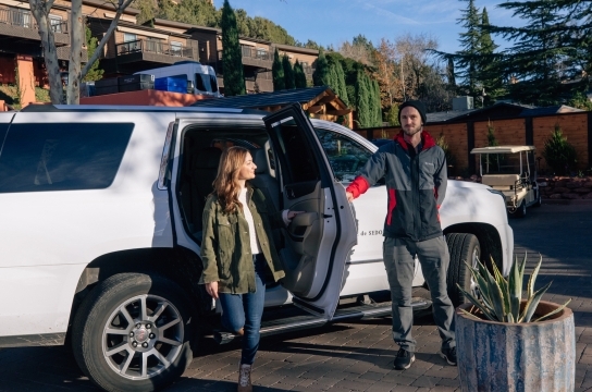 Guests exiting the property vehicle in driveway