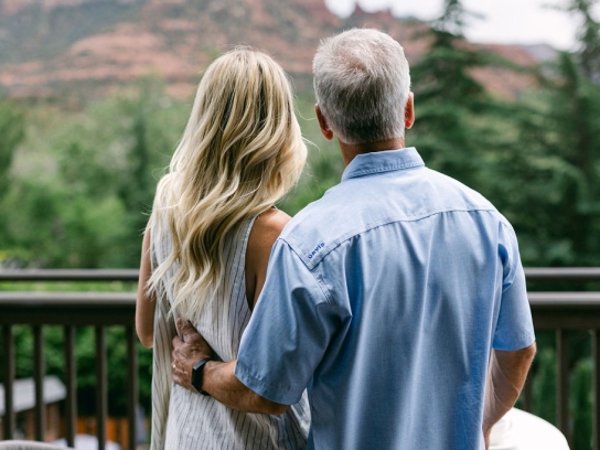 Couple Looking at Red Rocks