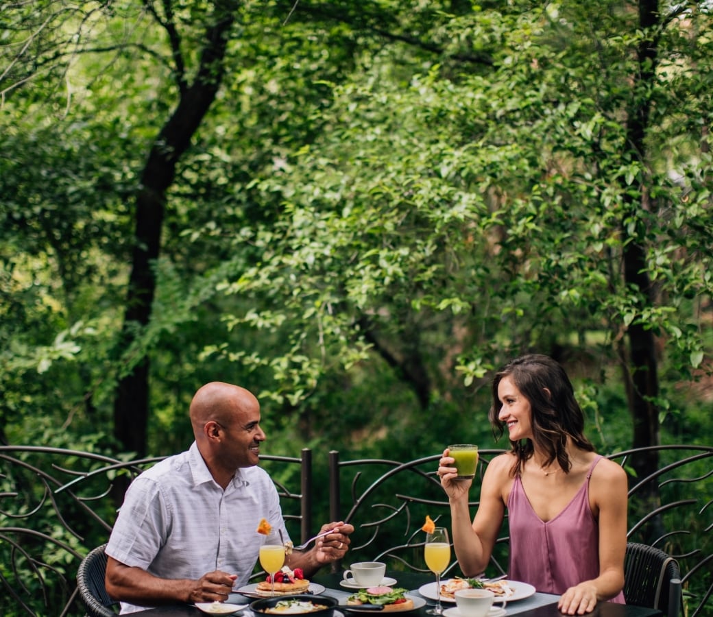 Sunday Brunch Creekside with a couple and full table